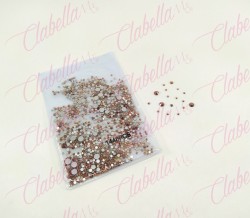 Decoración CRISTAL ROSA GOLDEN METALIZADO en diferentes tamaños para uñas aprox 1000 piezas por sobre