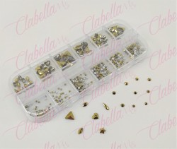 Decoración CRISTALES DORADO METALIZADO CON FIGURAS para uñas, aprox 400 piezas en pastillero – estuche de plástico de 13x5cm con