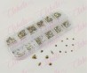 Decoración CRISTALES DORADO METALIZADO CON FIGURAS para uñas, aprox 400 piezas en pastillero – estuche de plástico de 13x5cm con