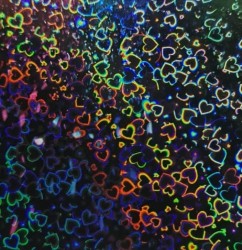 Rollo de laminado térmico holografico de 25m x 30cm tipo "Corazones"