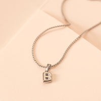 Dije de letra Silver
